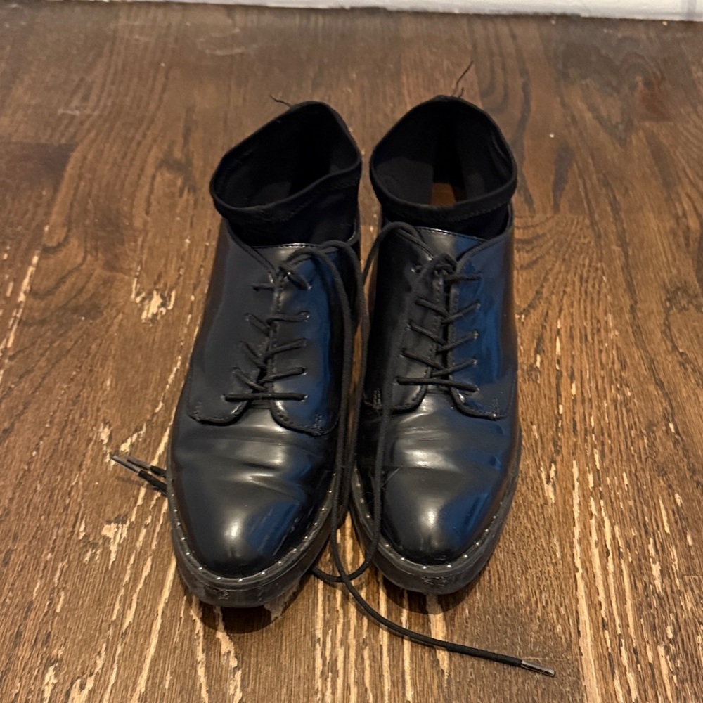 ZARA Trafaluc black patent leather studded loafers